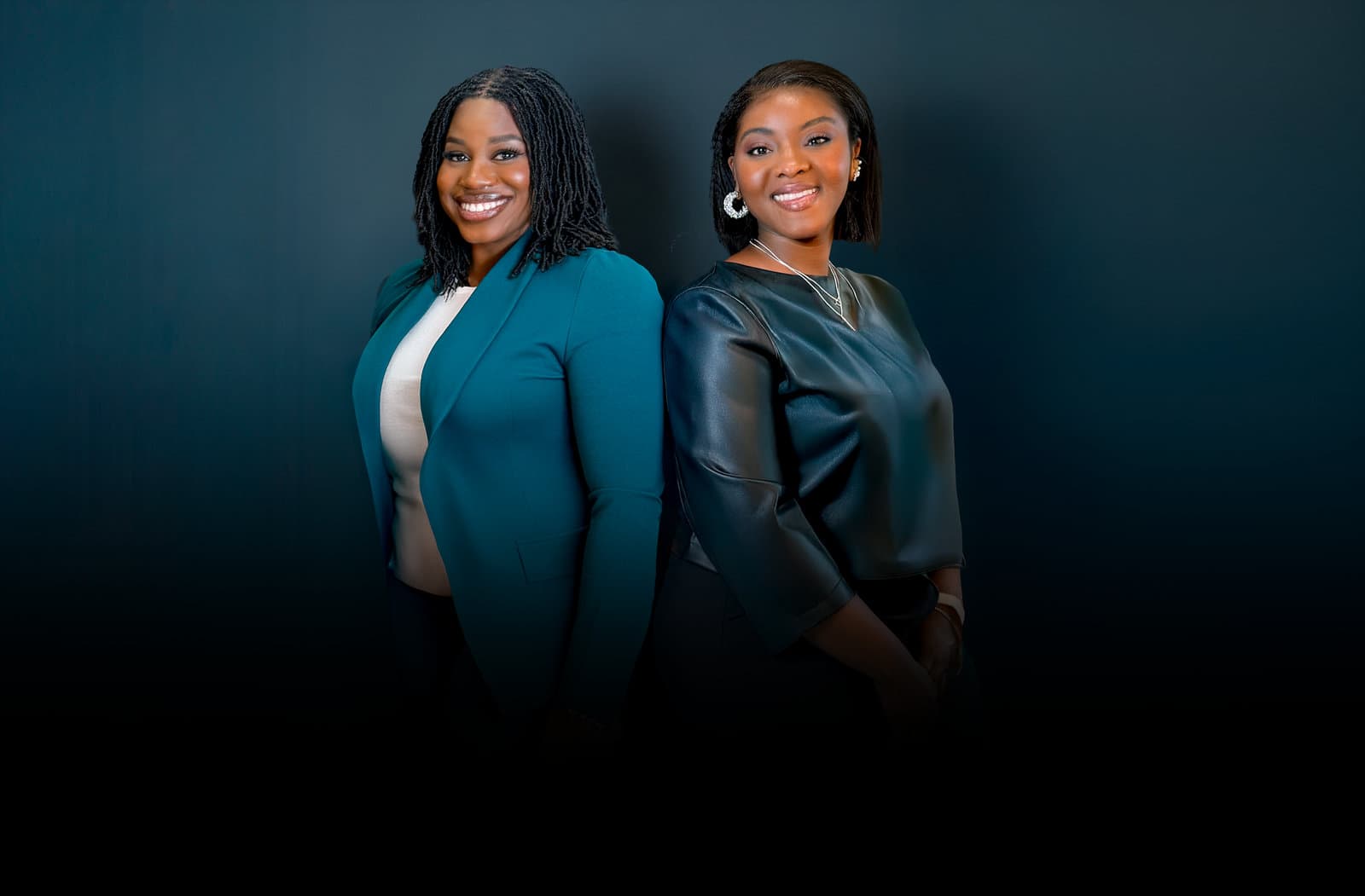 Reynette Romain and Bianca Meant, Reveye’s founding partners, standing back to back